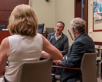 City of Anna Maria Mayor Mark Short shares an update on the Anna Maria Pier to Longboat Key Mayor Debra Williams (left) and Longboat Key Town Manager Howard Tipton (right) at a Barrier Island Elected Officials meeting May 6.