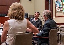 City of Anna Maria Mayor Mark Short shares an update on the Anna Maria Pier to Longboat Key Mayor Debra Williams (left) and Longboat Key Town Manager Howard Tipton (right) at a Barrier Island Elected Officials meeting May 6.