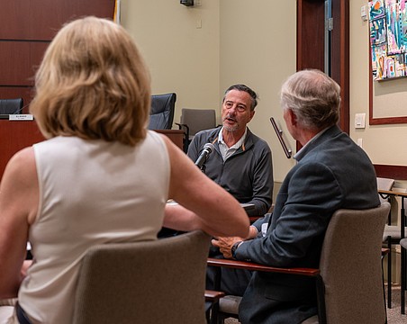 City of Anna Maria Mayor Mark Short shares an update on the Anna Maria Pier to Longboat Key Mayor Debra Williams (left) and Longboat Key Town Manager Howard Tipton (right) at a Barrier Island Elected Officials meeting May 6.