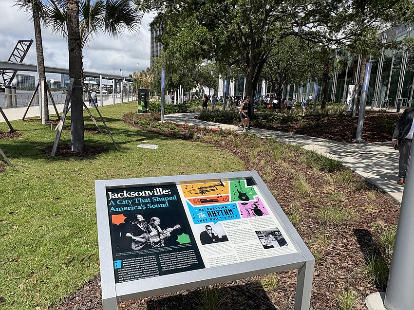A display highlights Jacksonville’s history near the Riverfront Music Garden entrance, adjacent to Riverfront Plaza.