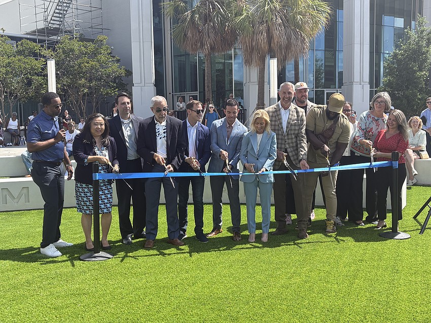 City leaders cut the ribbon at Riverfront Music Garden.