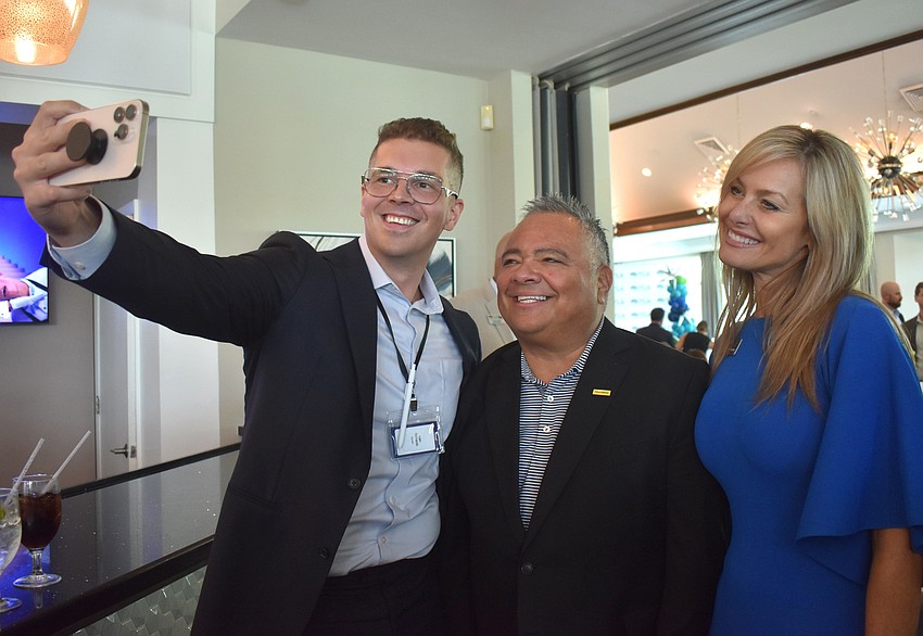 Ivan Richards of Truist Bank, Joe Flores of Edward Jones and Veronica Thames of the Manatee Community Foundation capture a moment at the YLA Next Gen Awards May 13.