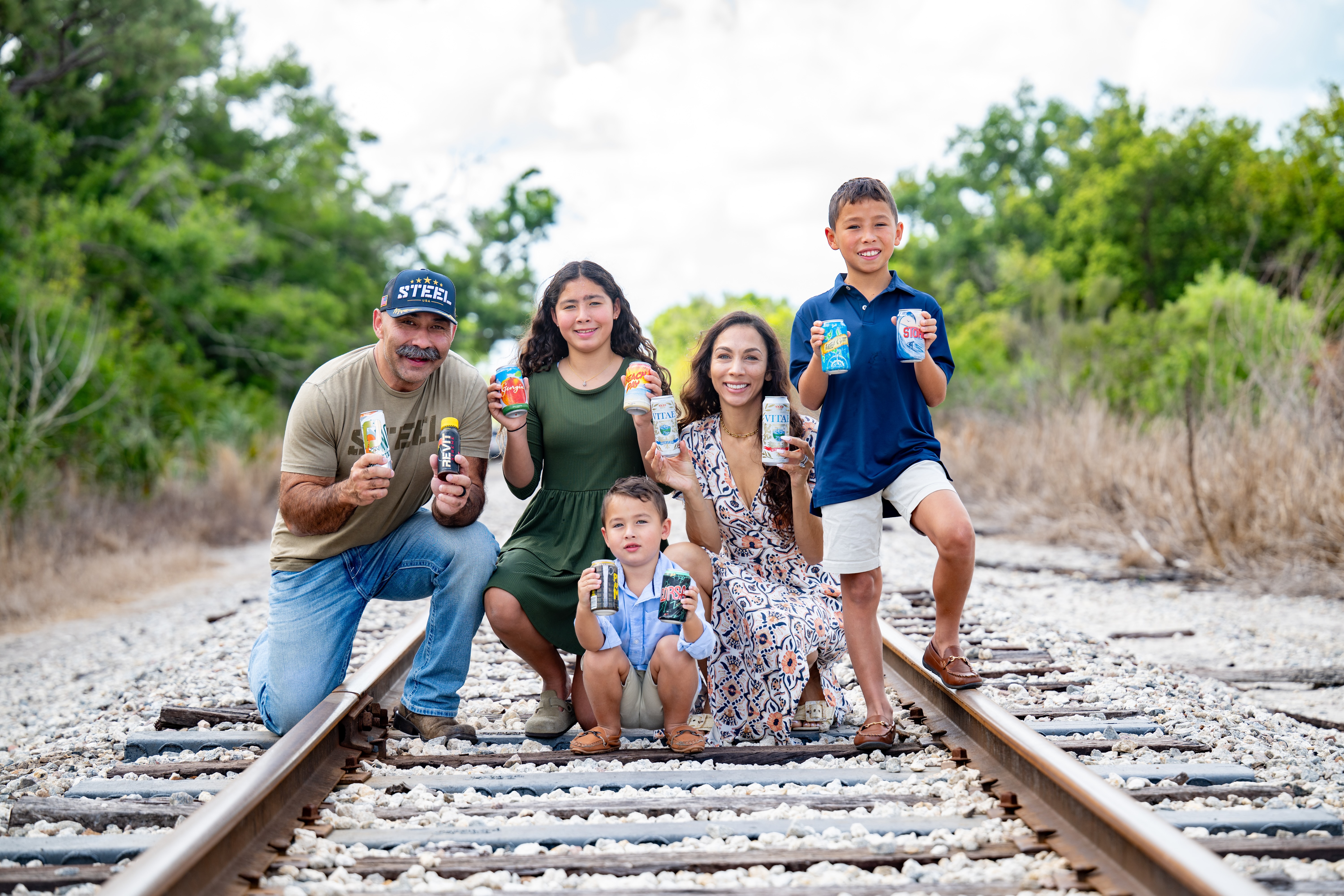 Jason Huh and his family — Angelina, Winston, wife Jessica and Leo — raise a can of Sodi Pop, the brand’s better-for-you soft drink designed with families in mind. Jason Huh and his family — Angelina, Winston, wife Jessica and Leo — raise a can of Sodi Pop, the brand’s better-for-you soft drink designed with families in mind.