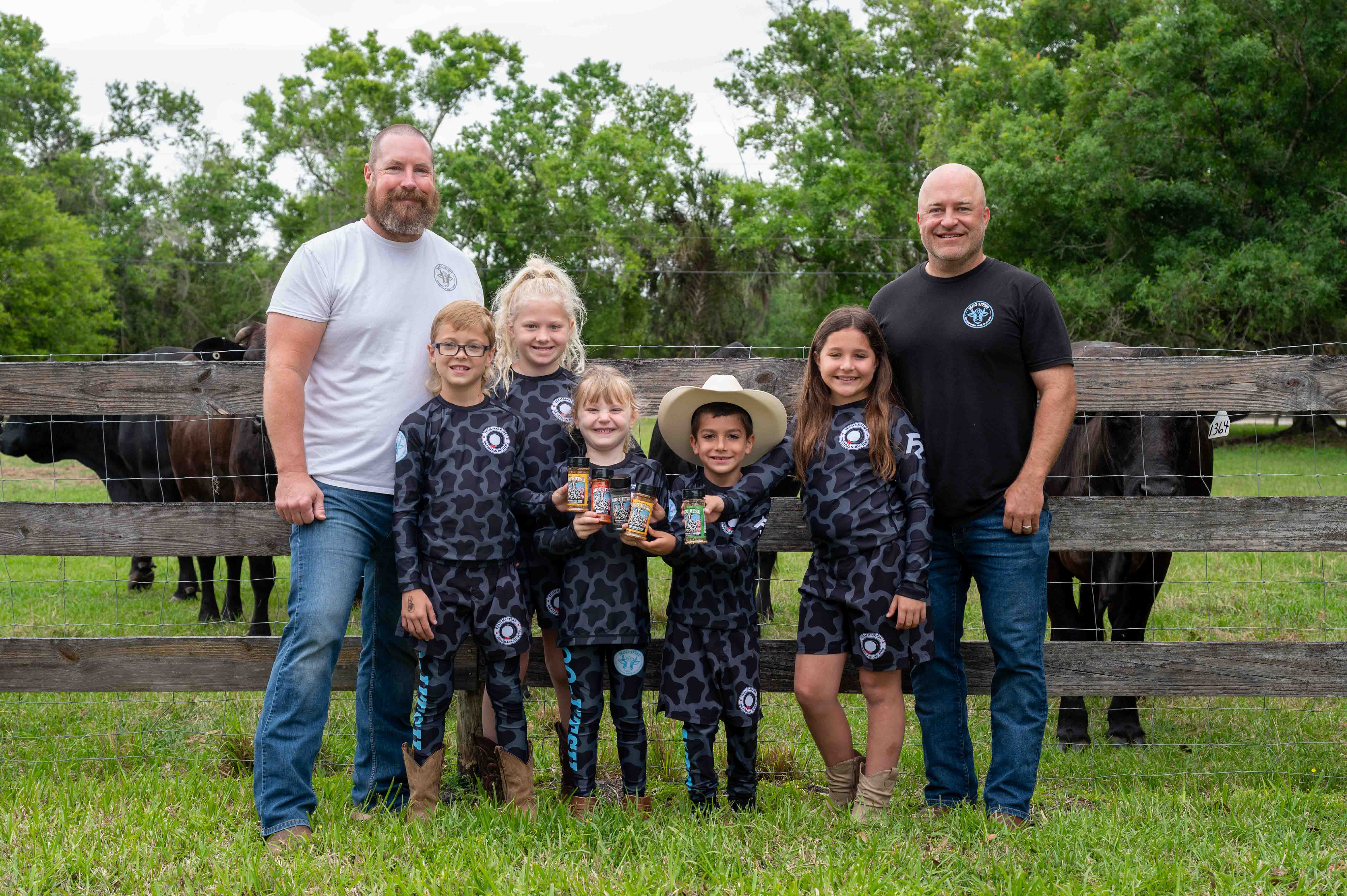 Scott Wacha, back left, and partner Brandon Whitman, back right, with their children Lily, Anna and Wes Wacha and Diego and Olivia Whitman, showcase the family spirit behind Moo-Jitsu, the homegrown spice brand they launched together. Scott Wacha, back left, and partner Brandon Whitman, back right, with their children Lily, Anna and Wes Wacha and Diego and Olivia Whitman, showcase the family spirit behind Moo-Jitsu, the homegrown spice brand they launched together.