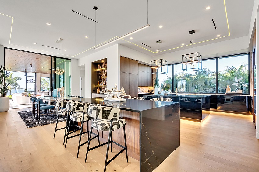 A state-of-the-art kitchen offers several different dining possibilities. A state-of-the-art kitchen offers several different dining possibilities.