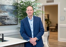 Jeff Toale stands inside the Robert Toale & Sons Celebration of Life Center in Lakewood Ranch, where light-filled spaces and a contemporary design reflect a shift toward more personalized, meaningful memorial experiences.