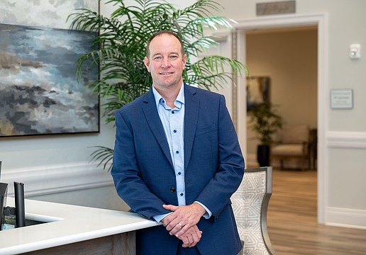 Jeff Toale stands inside the Robert Toale & Sons Celebration of Life Center in Lakewood Ranch, where light-filled spaces and a contemporary design reflect a shift toward more personalized, meaningful memorial experiences.
