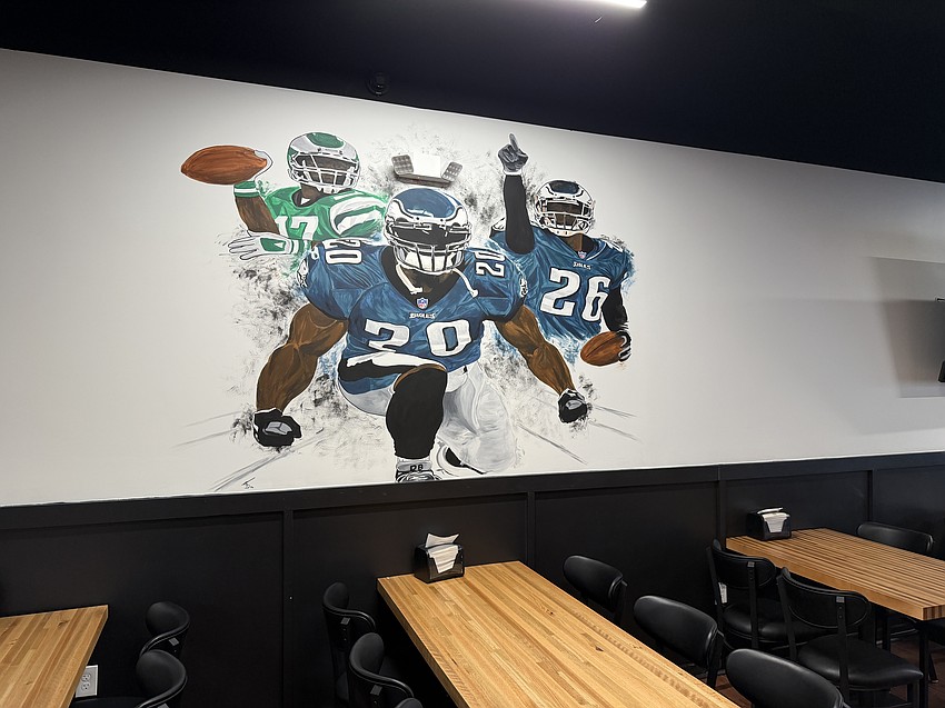 Dapper D's owner Darian “Jack” Jackson encourages Jaguars fans to tailgate downstairs at Dapper D’s Cigars & Restaurant, then go to the upstairs cigar lounge to watch the team play.
