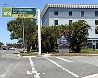 The new Kompose Hotel at SRQ Airport will be built behind this Hampton Inn along University Parkway.