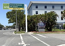 The new Kompose Hotel at SRQ Airport will be built behind this Hampton Inn along University Parkway.