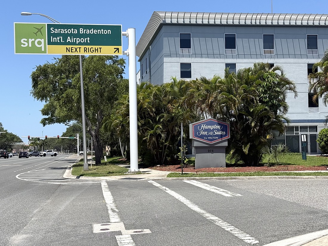 The new Kompose Hotel at SRQ Airport will be built behind this Hampton Inn along University Parkway.