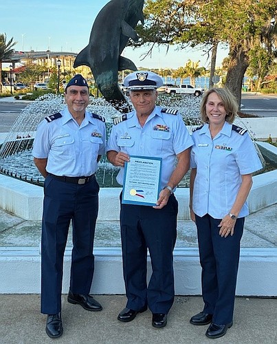 Flotilla Commander James Hans (center) alongside members of the U.S. Coast Guard Auxiliary Flotilla 44. Courtesy photo