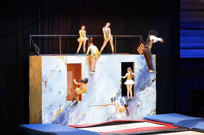 Sailor Academy do a trampoline act for the guests.