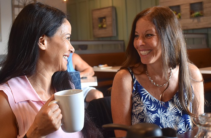 Nevriye Yesil, the founder of the Lakewood Ranch Happiness Circle, is glad to share her wisdom with friends and strangers alike, including Lisa Lieberman-Wang.