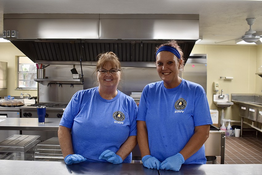 Deanna Sabatino and Lisa Russell will be working in the kitchen this summer. They're happy that the new kitchen has air conditioning.