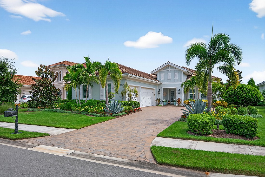 This Lake Club home at 8217 Pavia Way sold for $1.65 million. Built in 2021, it has three bedrooms, two-and-a-half baths, a pool and 2,427 square feet of living area.