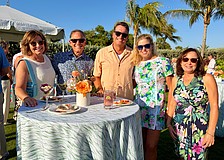 Karen and Gregg Sweeney, Chris and Cathy Goglia, and Debbie McPeak socialize at the Longboat Key Club's farewell lawn party on May 15.