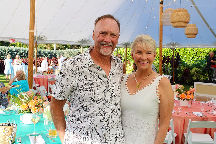 Michael and Jaleigh White check out the tent at the Longboat Key club lawn party farewell.
