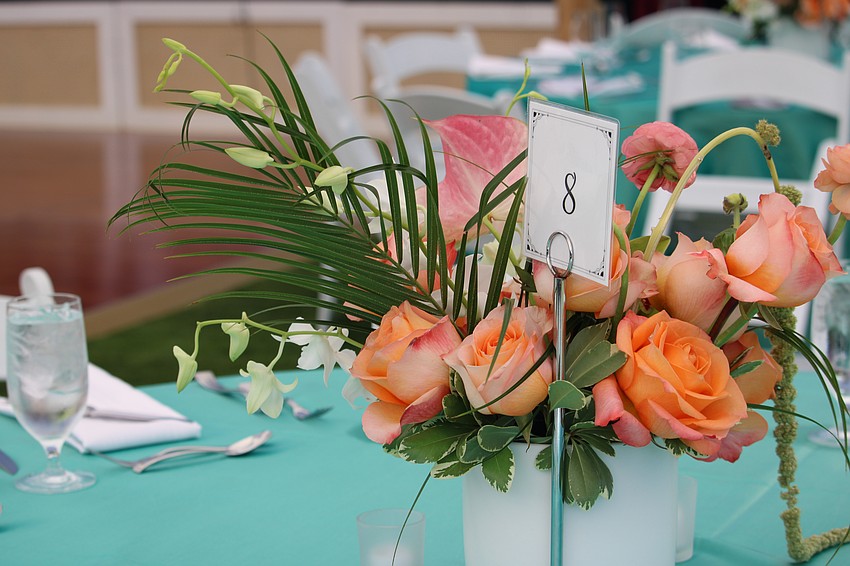 With pastel decor, woven chandeliers, and lights twinkling under the white tent, the Longboat Key Club farewell party set a dreamy scene on the lawn outside the Harbourside Ballroom.