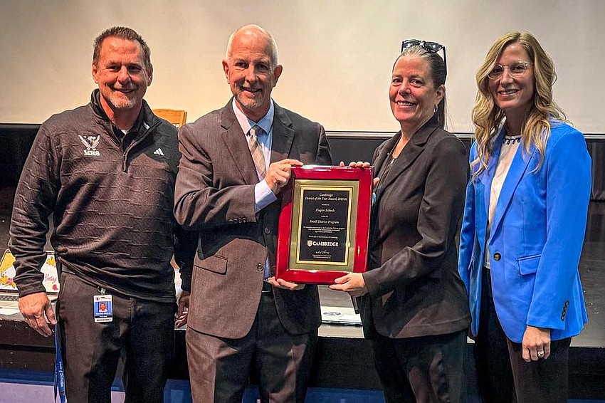 Donald Meyers of Cambridge Assessment International Education presented the Cambridge AICE program at Matanzas High School with its U.S. Small District of the Year award. From left, Matanzas Principal Mike Rinaldi, Meyers, Matanzas AICE Coordinator Erin Davis and Flagler Schools Assistant Superintendent Angela O'Brien. Courtesy photo Donald Meyers of Cambridge Assessment International Education presented the Cambridge AICE program at Matanzas High School with its U.S. Small District of the Year award. From left, Matanzas Principal Mike Rinaldi, Meyers, Matanzas AICE Coordinator Erin Davis and Flagler Schools Assistant Superintendent Angela O'Brien. Courtesy photo