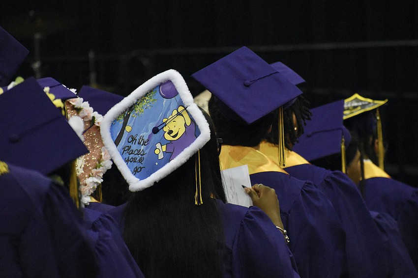 Aunya Jones celebrates graduation with a cap looking forward towards the future.