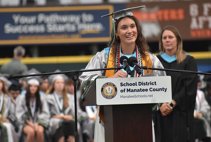 Julia Vendramini starts her graduation speech with numbers to show how much time has passed for seniors — 280 days since first day of senior year and around 4,673 days since the beginning of kindergarten.