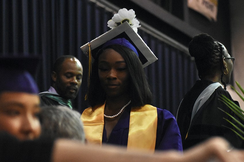 Hermoine Arneauxia Gillis heads across the stage.