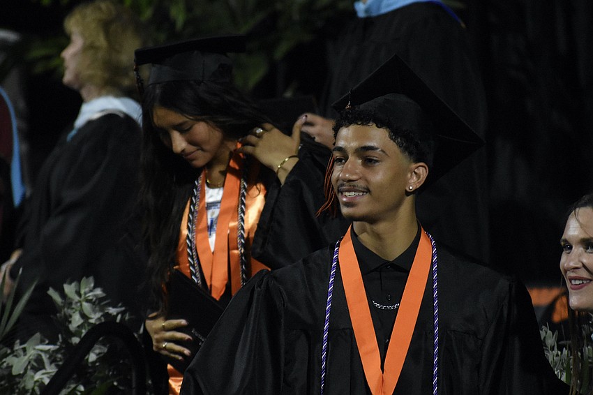 Fabiana Vera-Nunez and Jermain Trapp make their way off the stage.