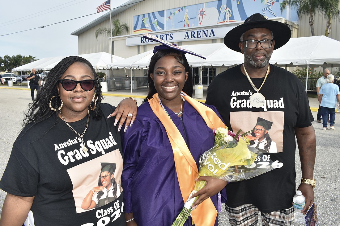 Anesha Green (center) celebrates with her mother, Shemere Green, and father, Cedric Green.