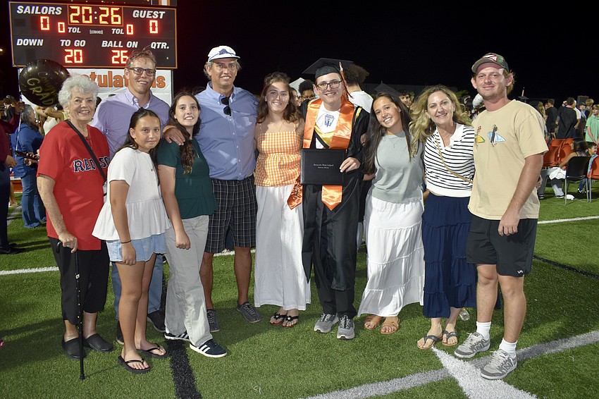 Bodhi Kirschner stands with his family including his Jane, Kelly, Charlie, Phoebe, Kent, Selby and Leila Kirschner, and Tracy and Nate Topjun.