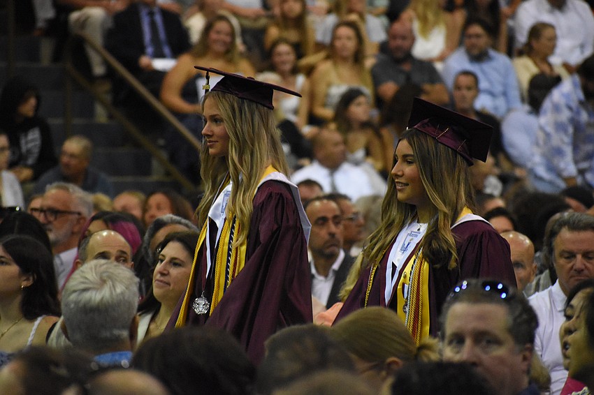 Lauren Marvel and Jillian Hughes make their way down the aisle.
