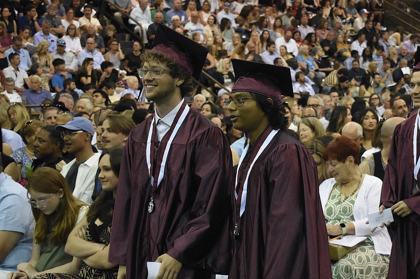 Noah Albright and Zayan Ali prepare to make the walk.