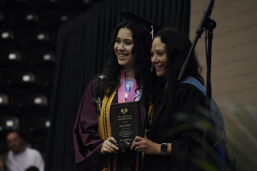 Luisa Kosar poses with Erin Haughey as she receives the Linda Nook Leadership Award.