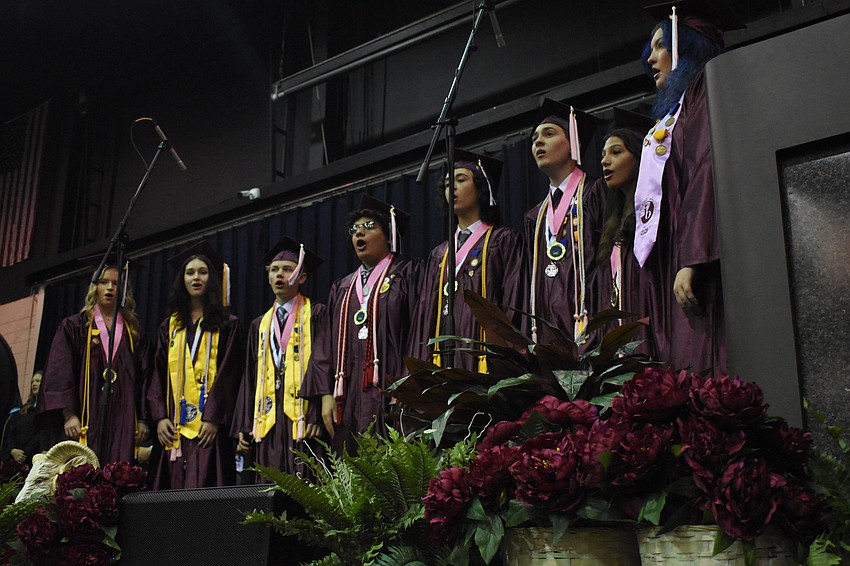 The Riverview High School choir performs the school's alma mater.