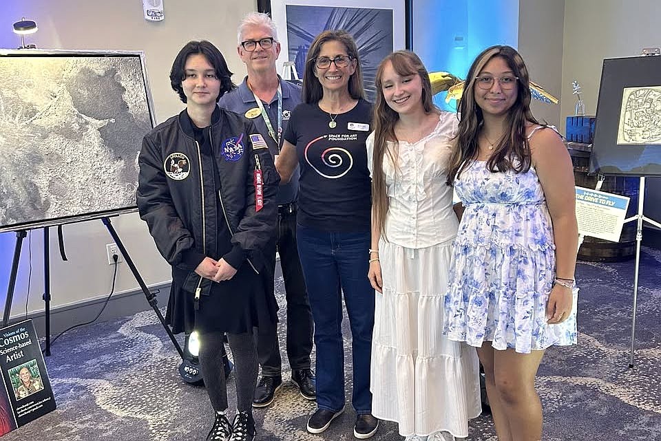 Drive to Fly aerospace art competition winners with astronaut, author, artist and engineer Nicole Stott, who served as the competition's judge at the Astronaut Hall of Fame at the Kennedy Center Visitor Complex with winners Olivia Massalone of DeLand High School, Lina Makhmutova of Matanzas High School and Maya Chebaro of Spruce Creek High School. Courtesy photo