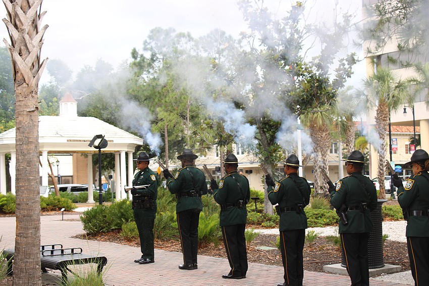 A 21-gun salute honors fallen law enforcement officers during the Manatee County Law Enforcement Memorial Service May 14.
