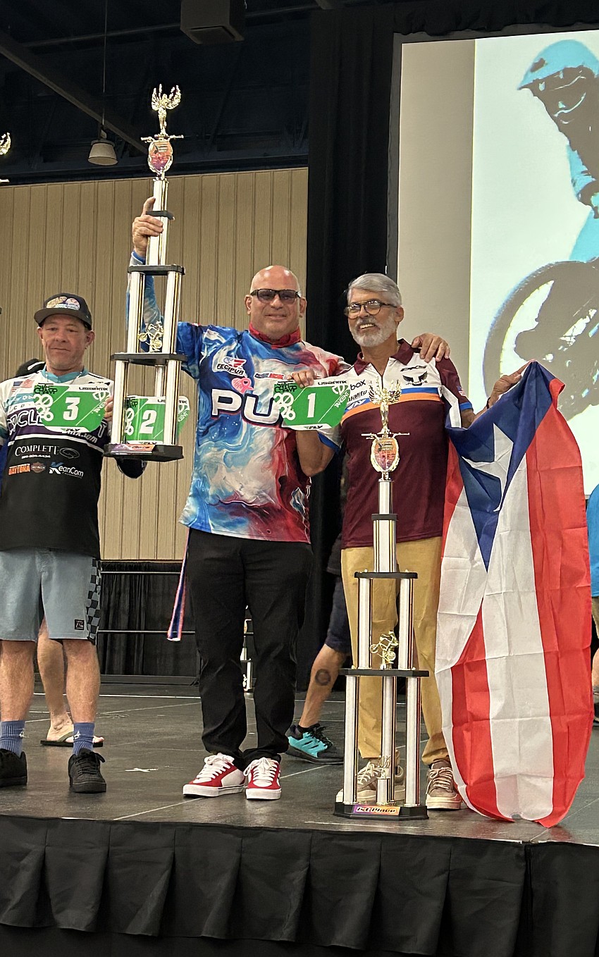 Palm Coast's Victor Ortiz (center) placed second in the USA BMX Florida State Championship Series in the age 50-60 intermediate class. Courtesy photo Palm Coast's Victor Ortiz (center) placed second in the USA BMX Florida State Championship Series in the age 50-60 intermediate class. Courtesy photo