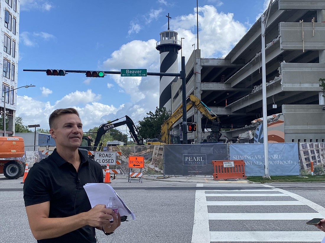 Bryan Moll, principal of Gateway Jax, led a May 19 media tour of Gateway's Pearl Square development in Downtown Jacksonville. Stops included the "lighthouse" parking garage at 721 N. Pearl St., where demoliton work is underway to create a restaurant on the southwest corner of the structure and retail space along the south wall.