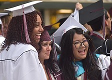 Jazmin Ortega, Alora Parcells and Suri Bui reminisce on their time at Braden River High School prior to the commencement ceremony at LECOM Park May 19.