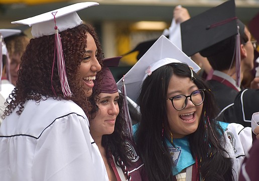 Jazmin Ortega, Alora Parcells and Suri Bui reminisce on their time at Braden River High School prior to the commencement ceremony at LECOM Park May 19.