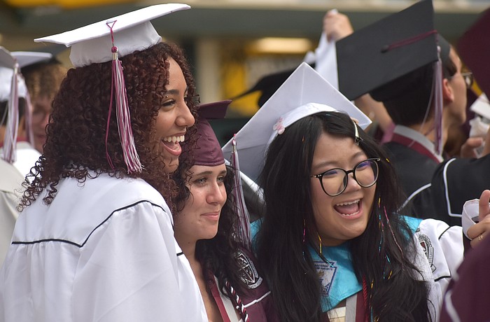 Jazmin Ortega, Alora Parcells and Suri Bui reminisce on their time at Braden River High School prior to the commencement ceremony at LECOM Park May 19.