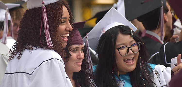Jazmin Ortega, Alora Parcells and Suri Bui reminisce on their time at Braden River High School prior to the commencement ceremony at LECOM Park May 19.