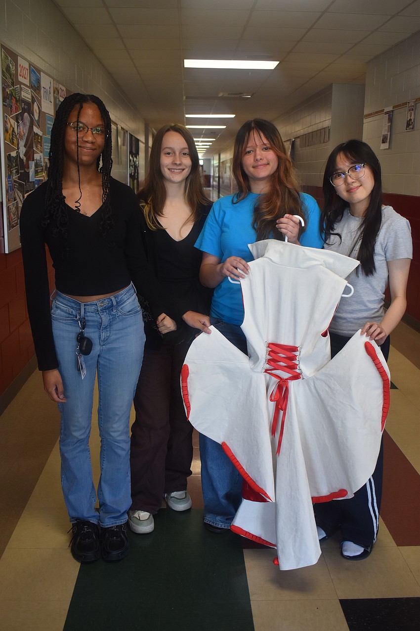 Braden River High School's Gabriella Smith, Sofia Taggart, Angela Vetter and Hannah Thai created a dress with direction of the assigned theme 