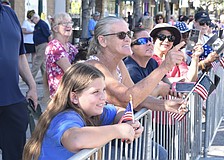 The annual Memorial Day parade kicks off on Main Street in Sarasota at 10 a.m. on Monday, May 25. Rebecca Souders, 10, Jessica Wilhelm and Beth Duranceau watch the parade in 2023.