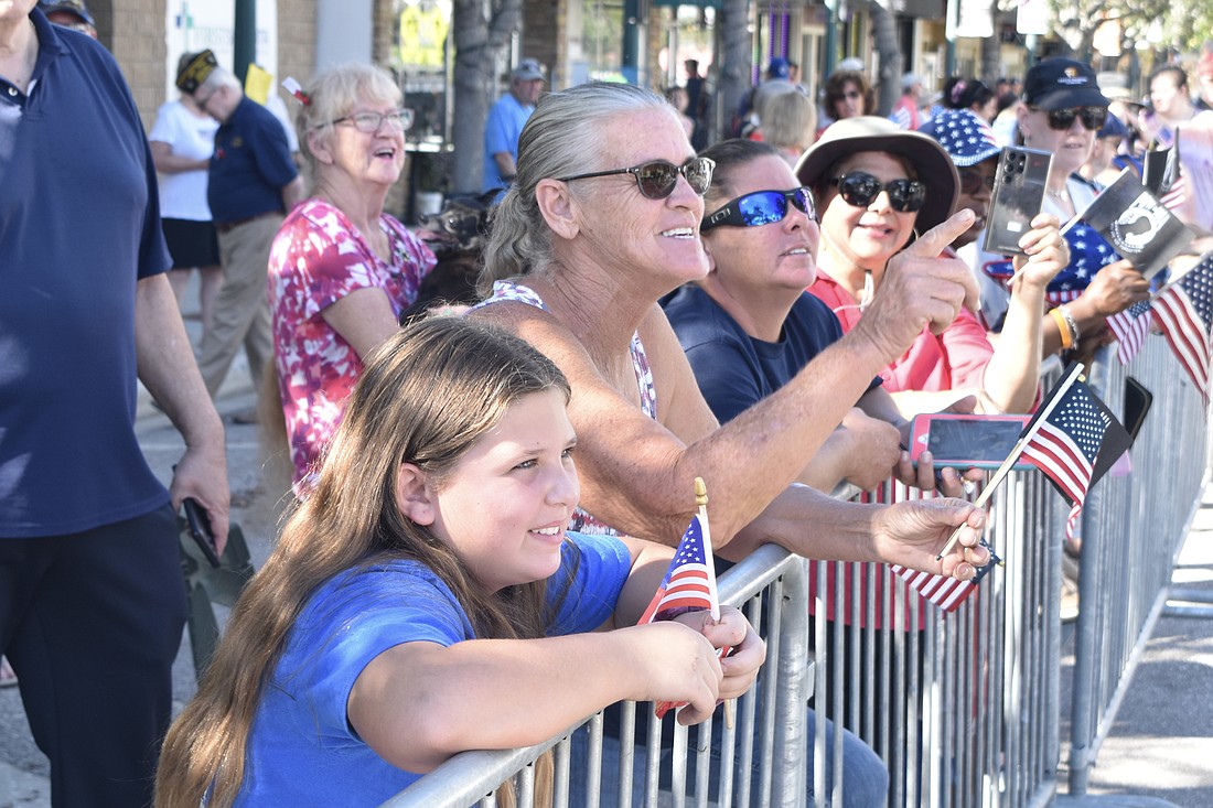 The annual Memorial Day parade kicks off on Main Street in Sarasota at 10 a.m. on Monday, May 25. Rebecca Souders, 10, Jessica Wilhelm and Beth Duranceau watch the parade in 2023.