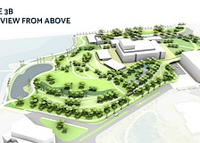 A massing model of The Bay phases 3A and 3B show a parnking deck to the right, to the left the Sarasota Performing Arts Center location flanked by two restaurant spaces and the current parking lot converted to green space. The Van Wezel is at the bottom left corner.