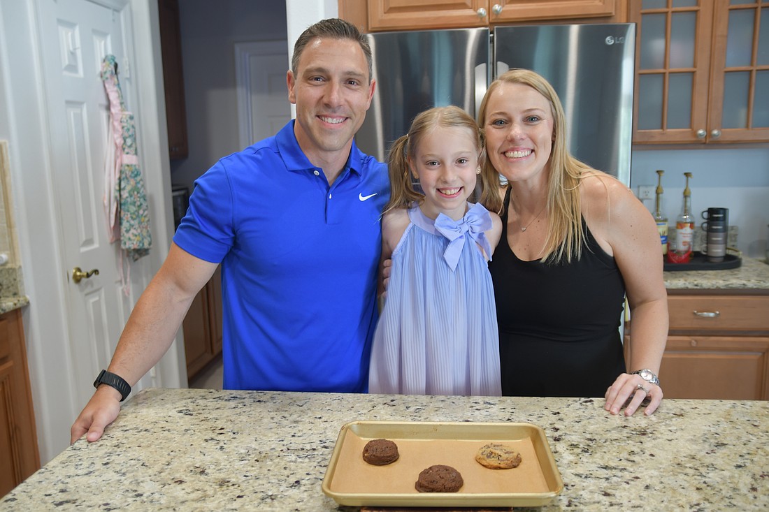 The Sutton family spends lots of time in the kitchen baking cookies together.