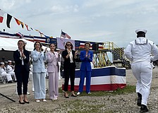 Robyn Modly, right, and her three daughters and daughter-in-law — the matrons of honor — cheered the 100 crew members as they ran by to board and officially staff the ship. From left: Natalie Modly Schmidt, Amanda Merkle Modly, Dorian Modly and Noelle Modly Ulman.