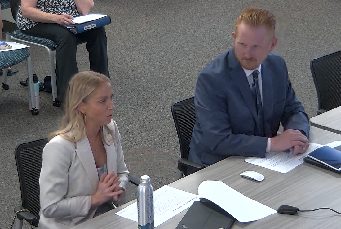 Brown & Brown Senior Vice President Danielle Boyle and Flagler Schools HR Chief Joshua Walker go over the new helath insurance plan at the School Board workshop. From Flagler Schools meeting video