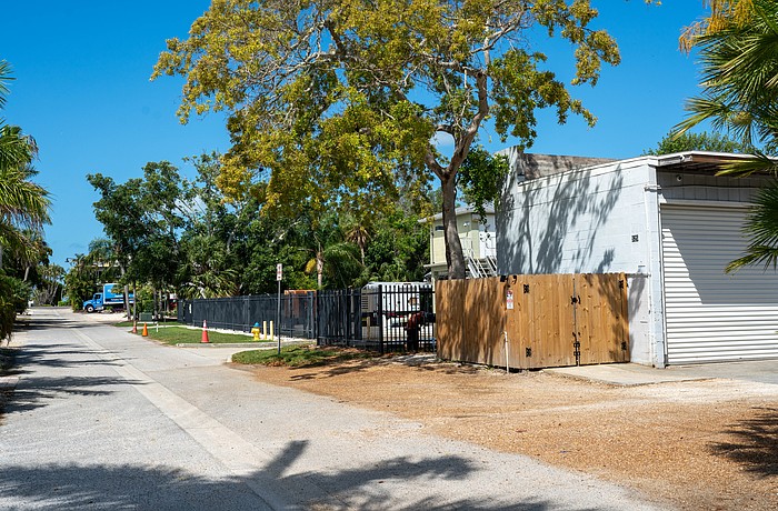 Grant's Gardens has a two-bay garage at 525 Gulf Bay Road, and is proposing to build an office building on the lot across the street at 524 Gulf Bay Road.